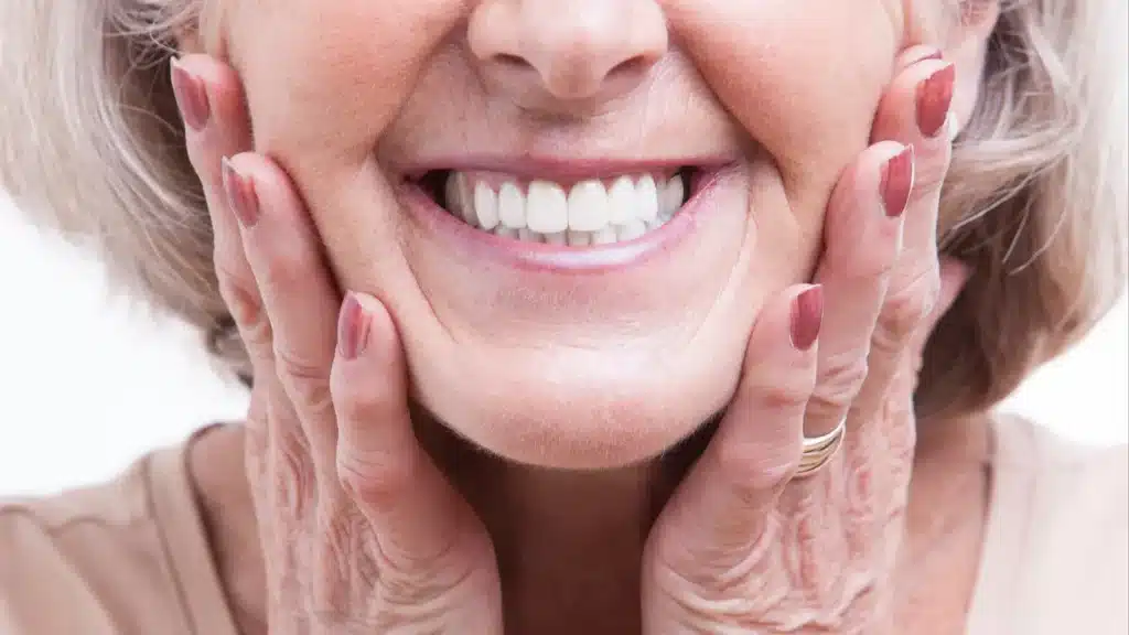 smiling with dentures in mouth